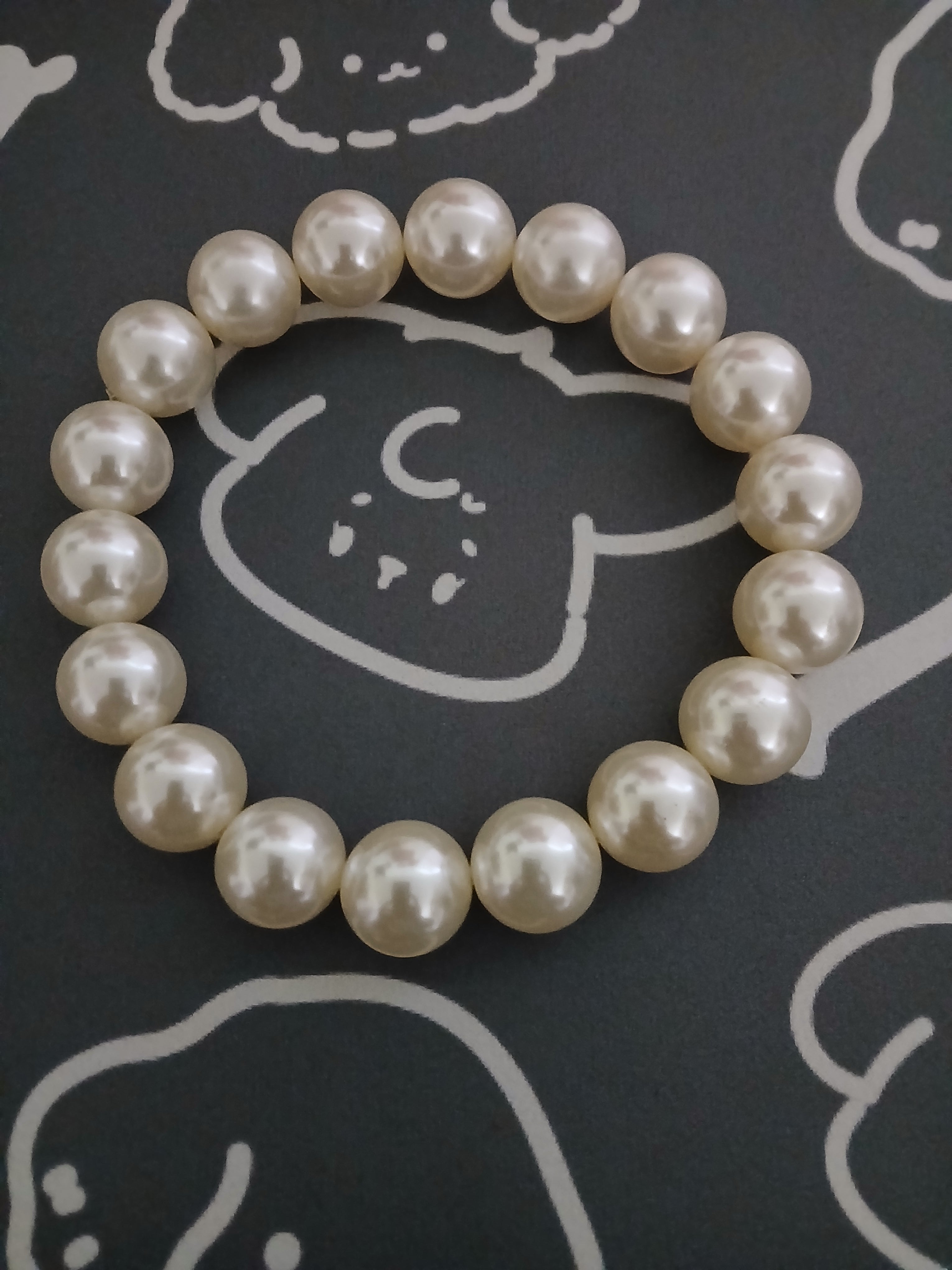 Pearls for the Pup Who Loves to Shine.”